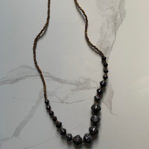 Beautiful paper bead necklace by 31 Bits